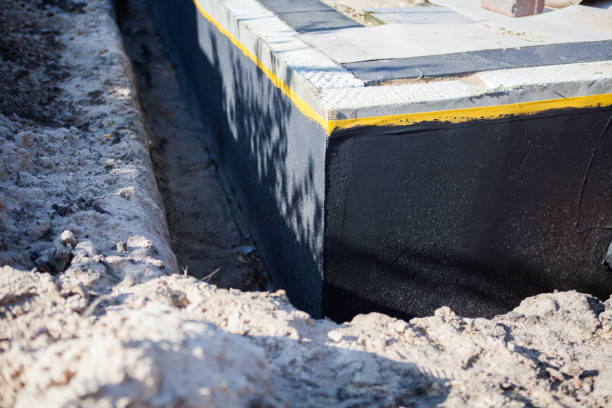 Professional Waterproofing technician working in Butte Des Morts, WI
